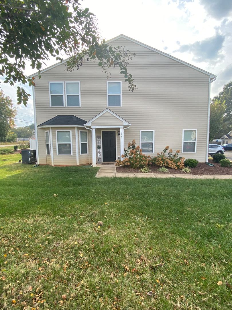 End Unit with large yard.