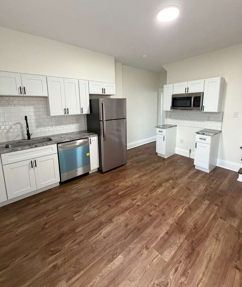 Rare 2-Full Bath Find: Pristine Renovation with Designer En-Suite  Granite