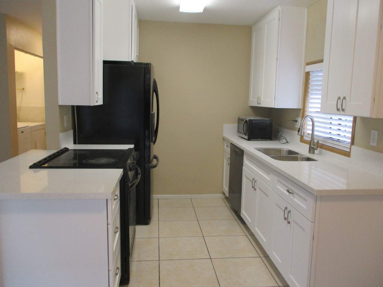 Very nice 2 bedroom 1.5 bath 1st floor condo