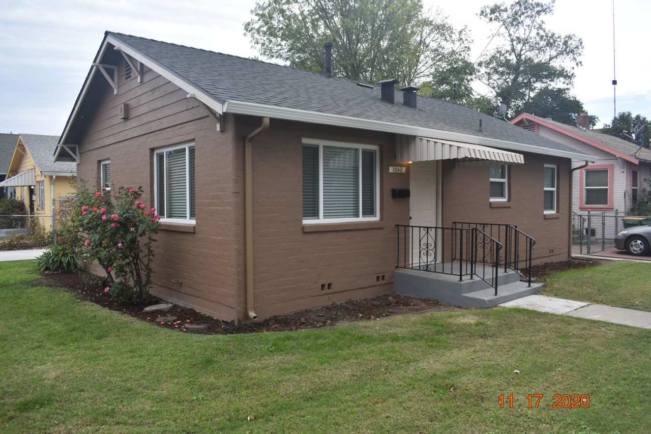 Darling Two Bedroom Home with all New Carpet/ Paint/ Dual Pane Windows/ Garage