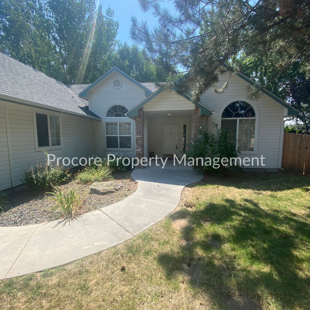 Newly painted...Charming 3-Bedroom, 2-Bath Eagle Home with Elegant Finishes and Cozy Fireplace
