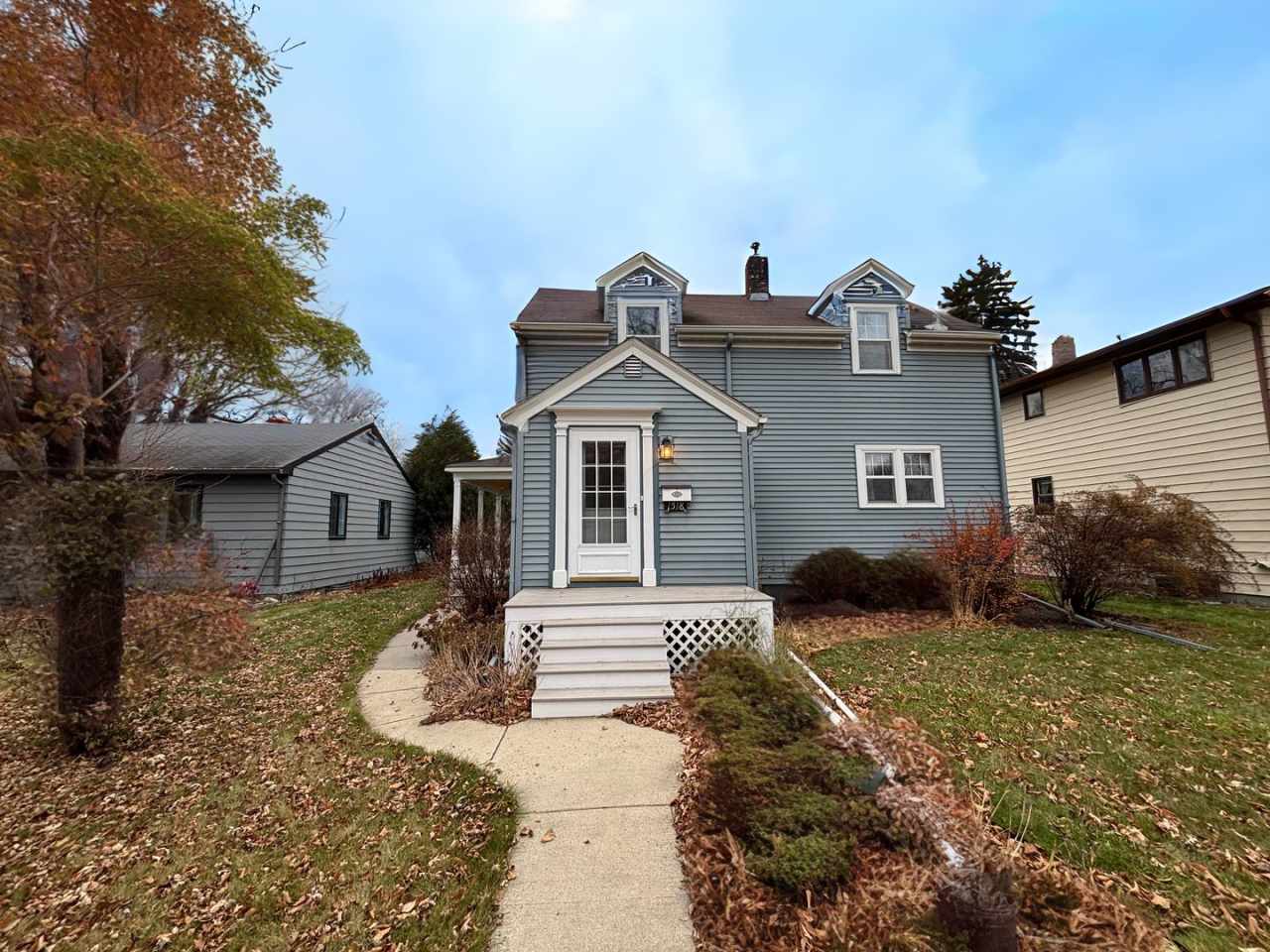 Charming 3×2 Home with Wrap-Around Porch  Detached Double Garage – $1,795/Month