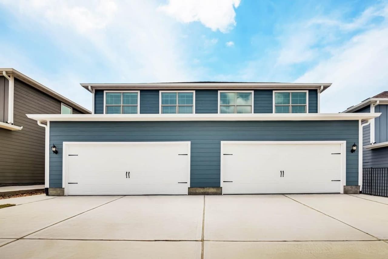 This beautifully designed, two-story townhome is located in South Park Meadows