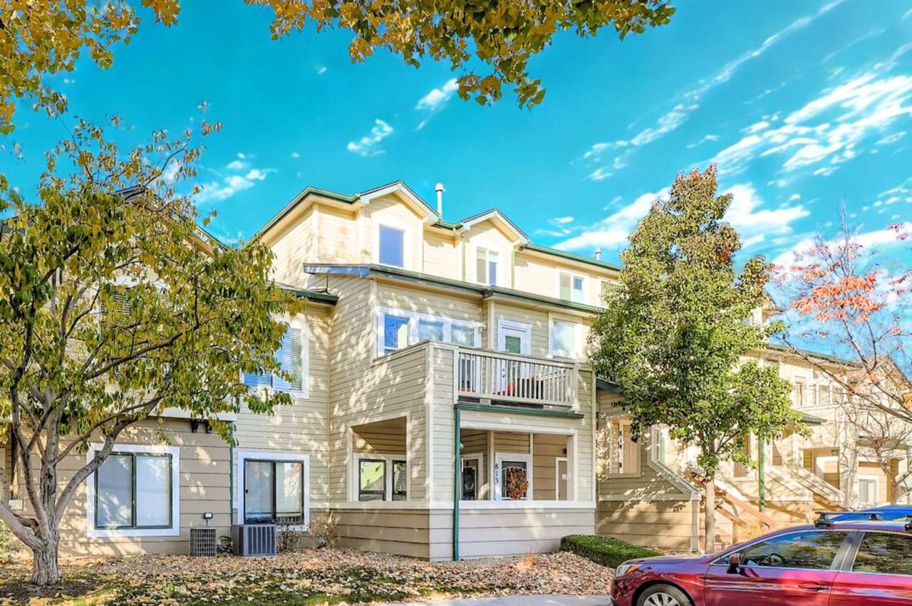 Light-Filled Corner Condo with Garage + Reserved Parking in Gated Community