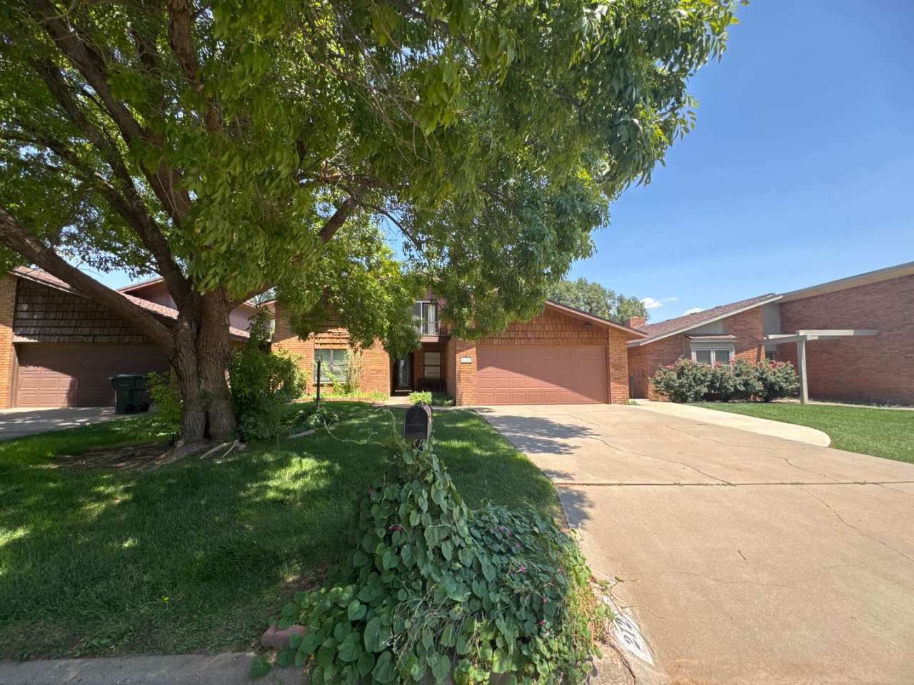 Two-story, four-bedroom, three-bathroom home with a golf course view.