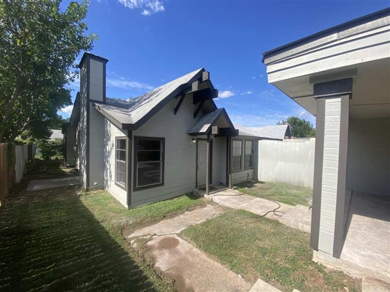 Large 2/2 duplex with a 2 car carport