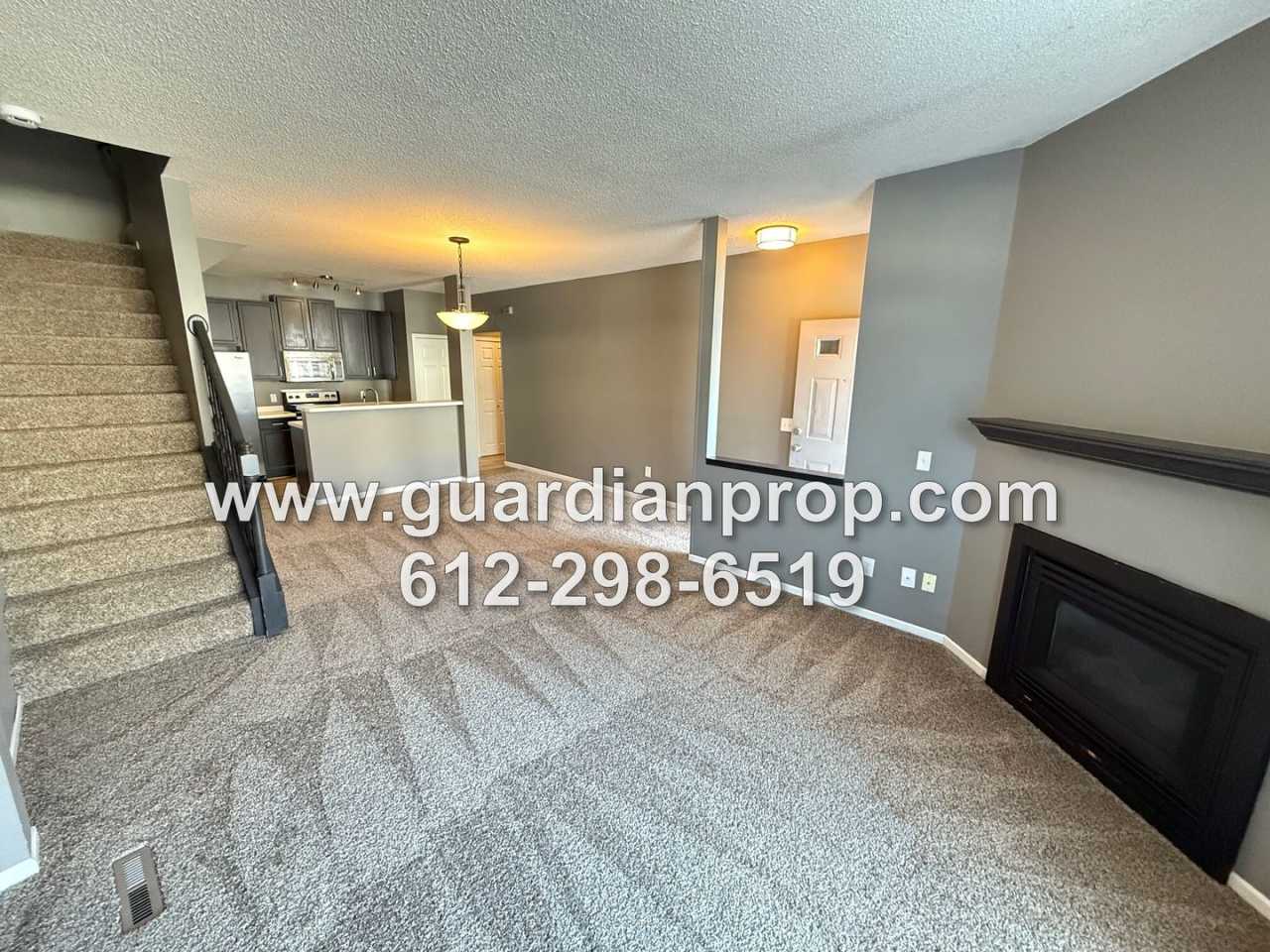 Woodbury Townhouse Available Now, Open Floor Plan, Loft Area, Fireplace, New Carpet!