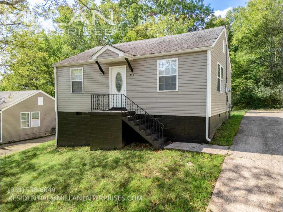 Welcome Home To 854 E Happy Hollow Drive Featuring An Open Floor Plan