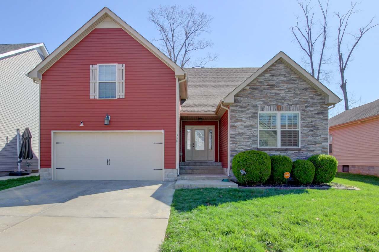Fantastic Open Floor Plan Home With Stone Front Fireplace, Stainless Steel Appliances, And Close to Restaurants, Shopping and Fort Campbell.