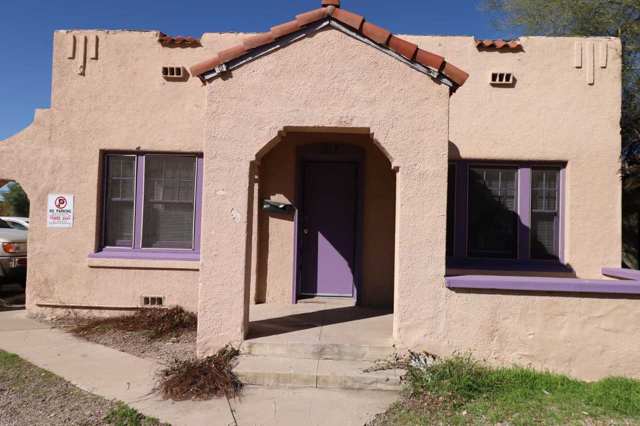 VINTAGE HOME WITH HUGE BACKYARD AND A UNIQUE FLOOR PLAN!