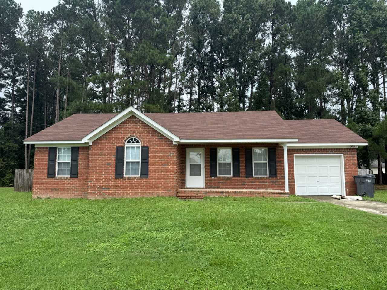 3 bed, 2 bath home with back yard and one car garage