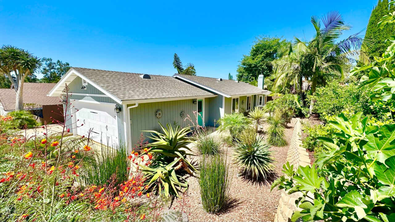 Welcome to the Jungle! This Sweet Single-Story Bungalow Style Home awaits you on North Main Ave, Walking Distance to all the Fun, Yet Worlds Away!