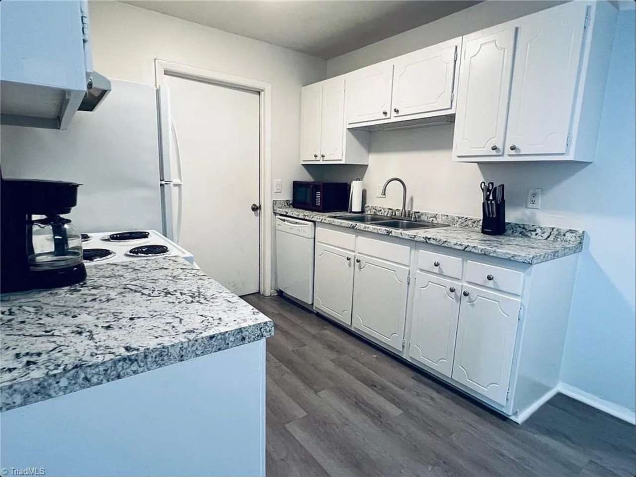 Welcome to this charming 3-bedroom, 2-bath condo, ideally located in a beautifully maintained community!