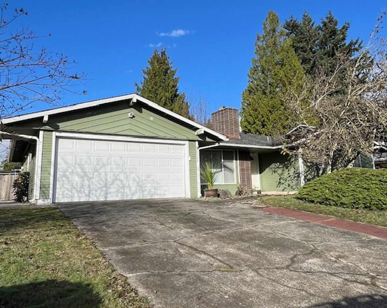 4 Bedroom, 2 Bath Rambler, Large Fenced back yard, Attached Garage.