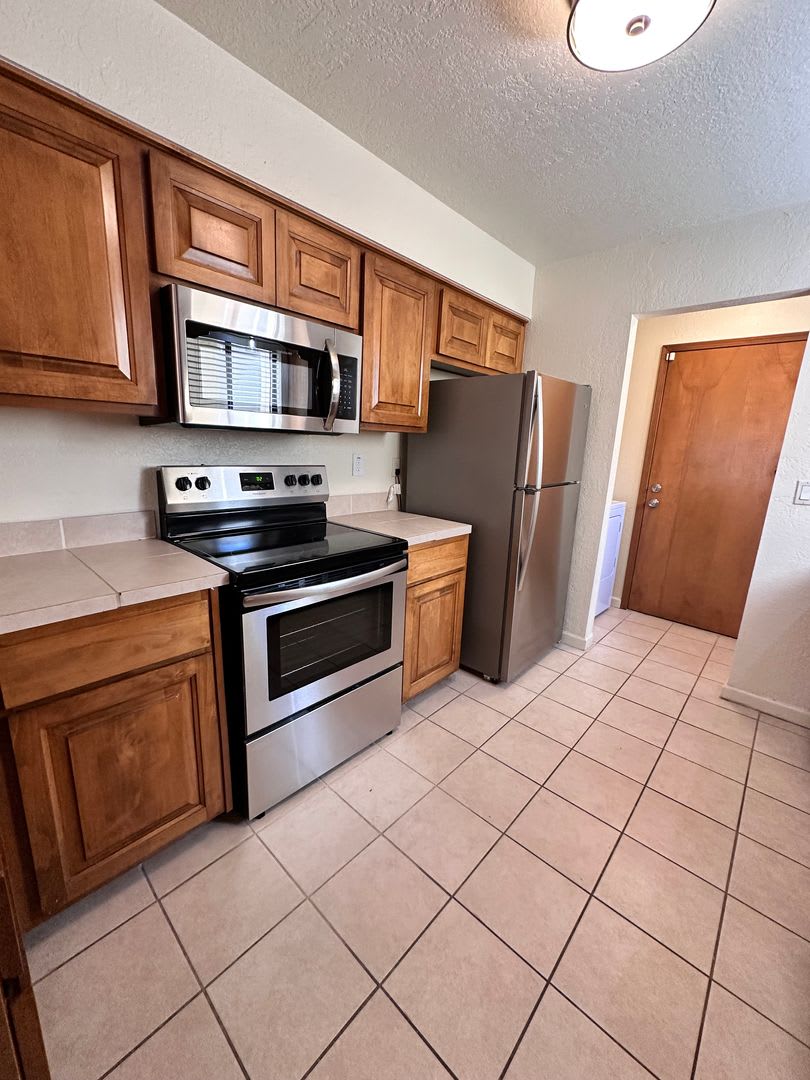 Move in Special! 2 Bedroom 2 Bath Townhome w/2 Car Garage and Refrigerated Air