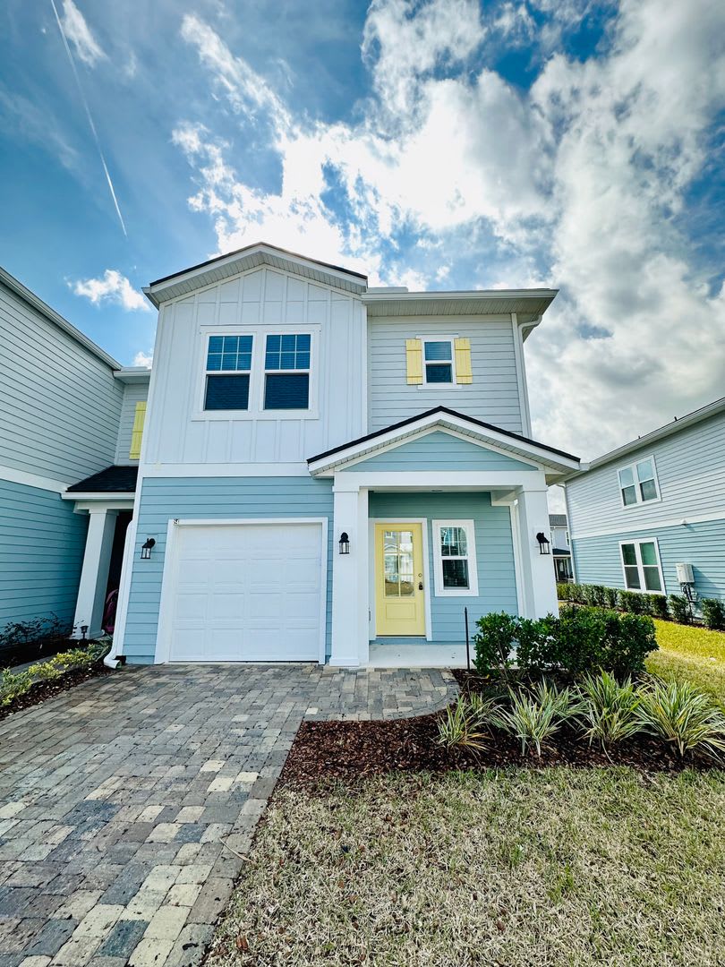 Spacious End Unit with Garage  Loft. Community features High End Amenities!