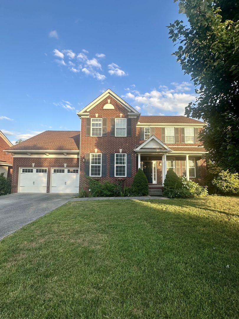 Lovely all brick home on corner lot in desirable Providence