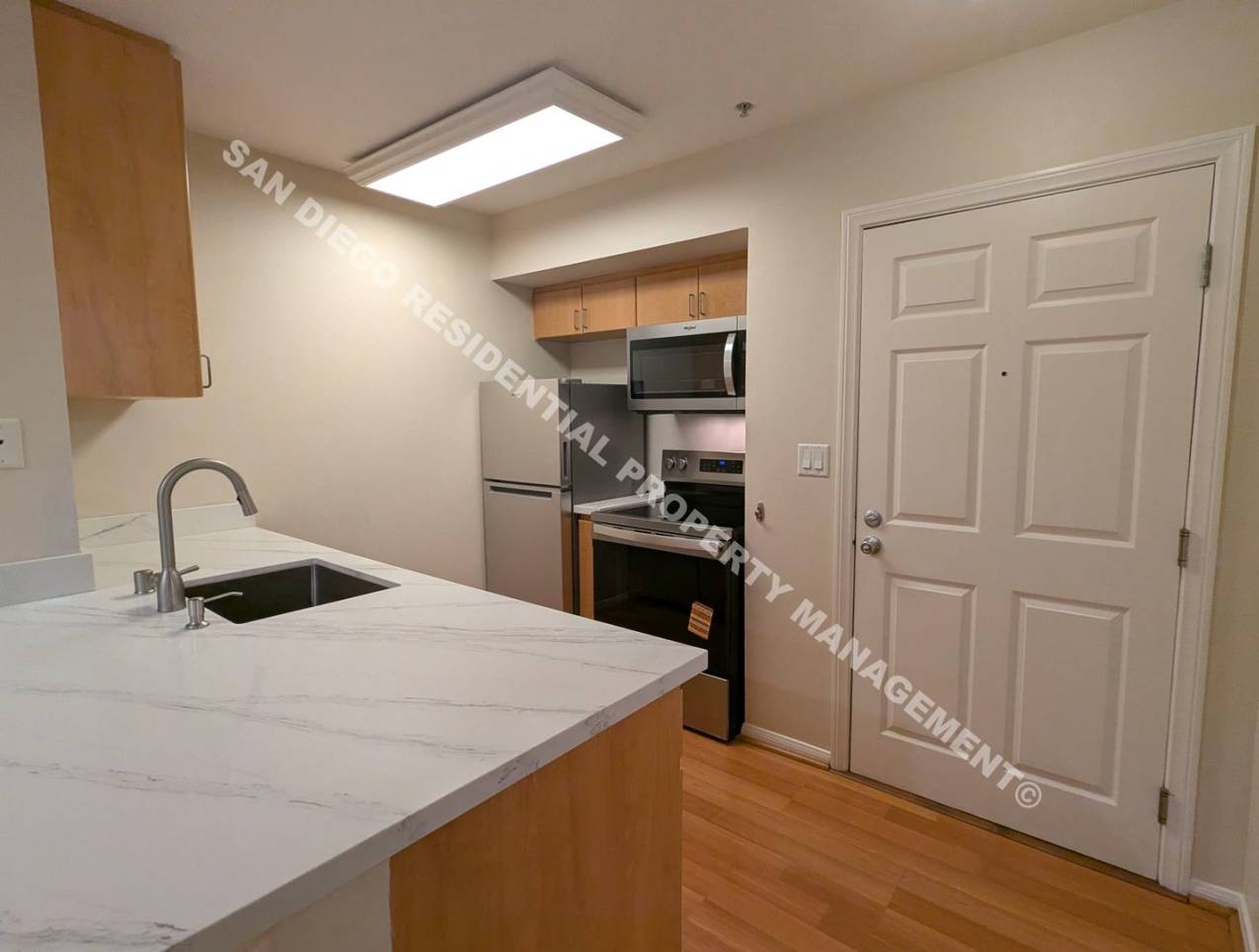 ***$200 MOVE-IN DISCOUNT*** Updated Studio with Parking and Washer/Dryer in Prime Little Italy Location