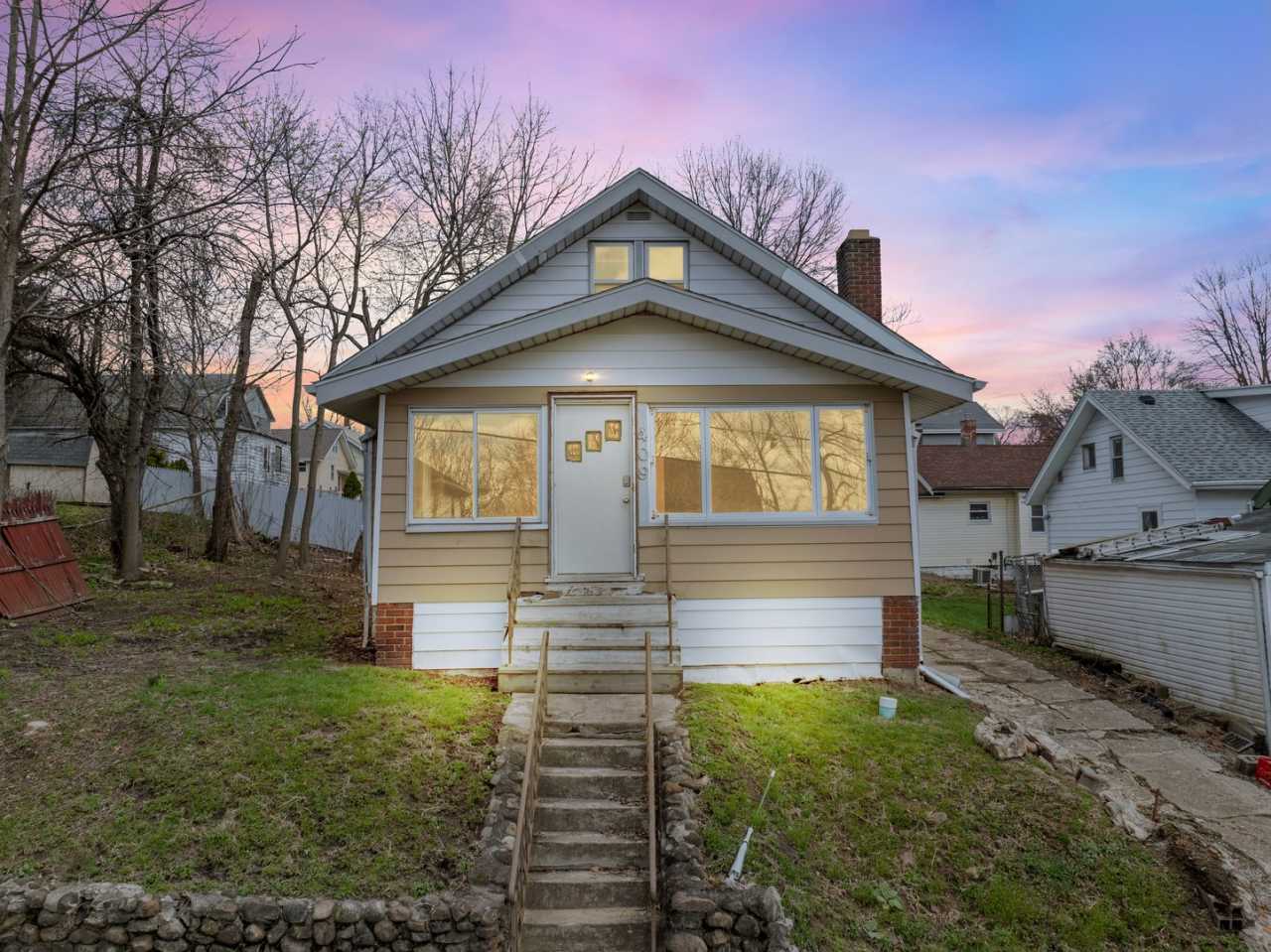 Classic 1928 Goodyear Heights charmer—fireplace, yard  off-street parking