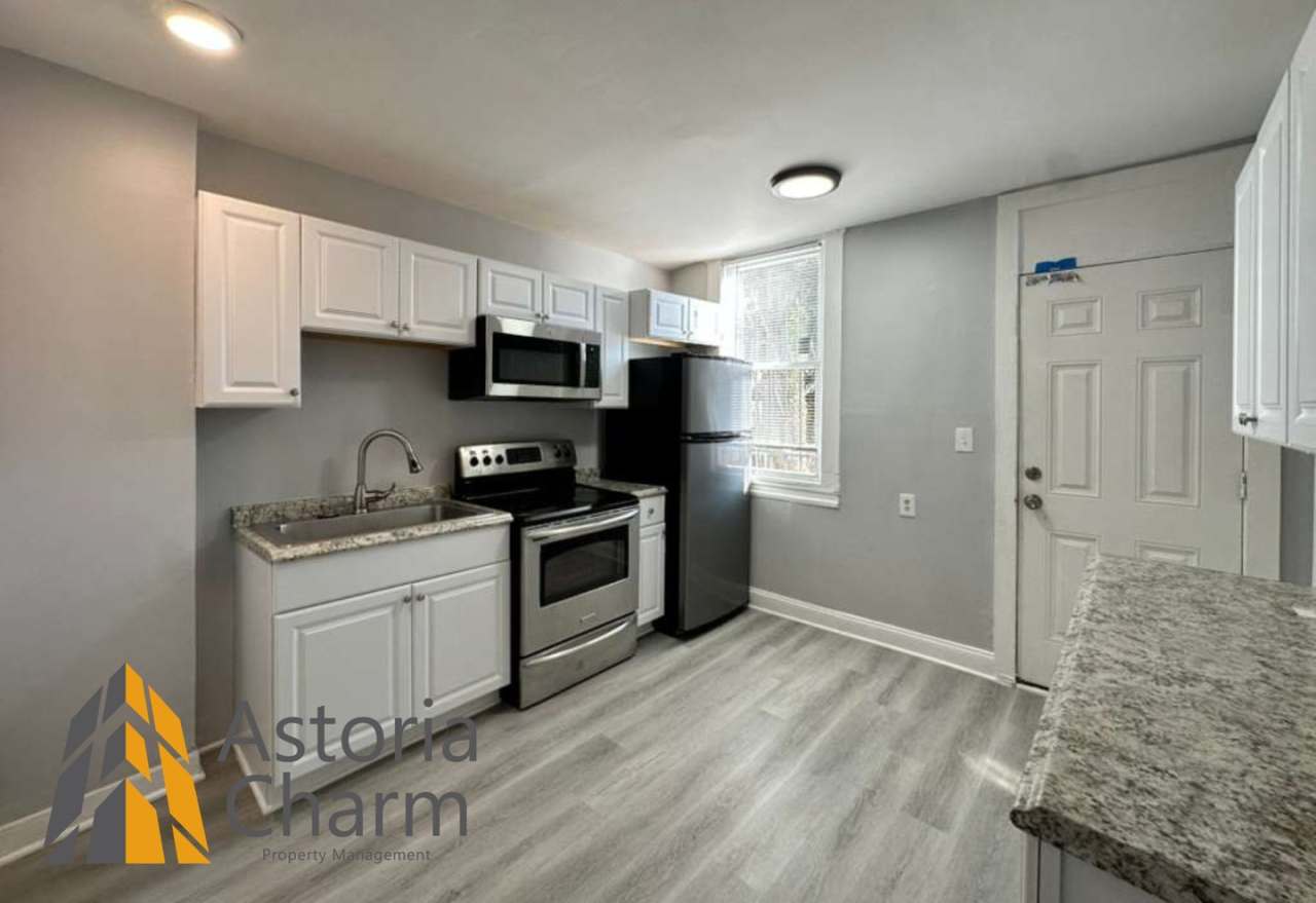 3 Bedroom Plus Den Home with Renovated Kitchen and Fenced Yard