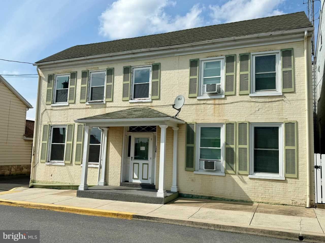 136 EAST MADISON ST