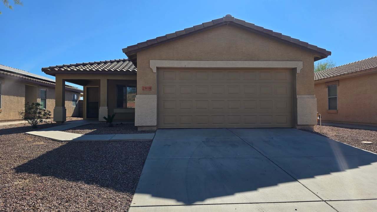 Three bedrooms plus a den at an affordable price! New carpet!