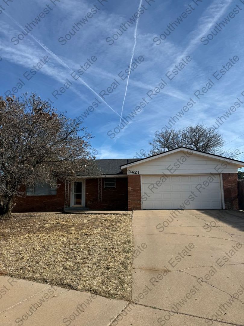 Spacious 4 bedroom 2 bath brick home