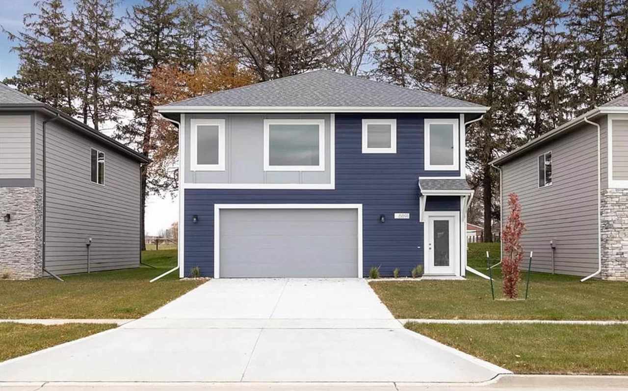 Beautiful single family home With 6 Car Attached Garage!