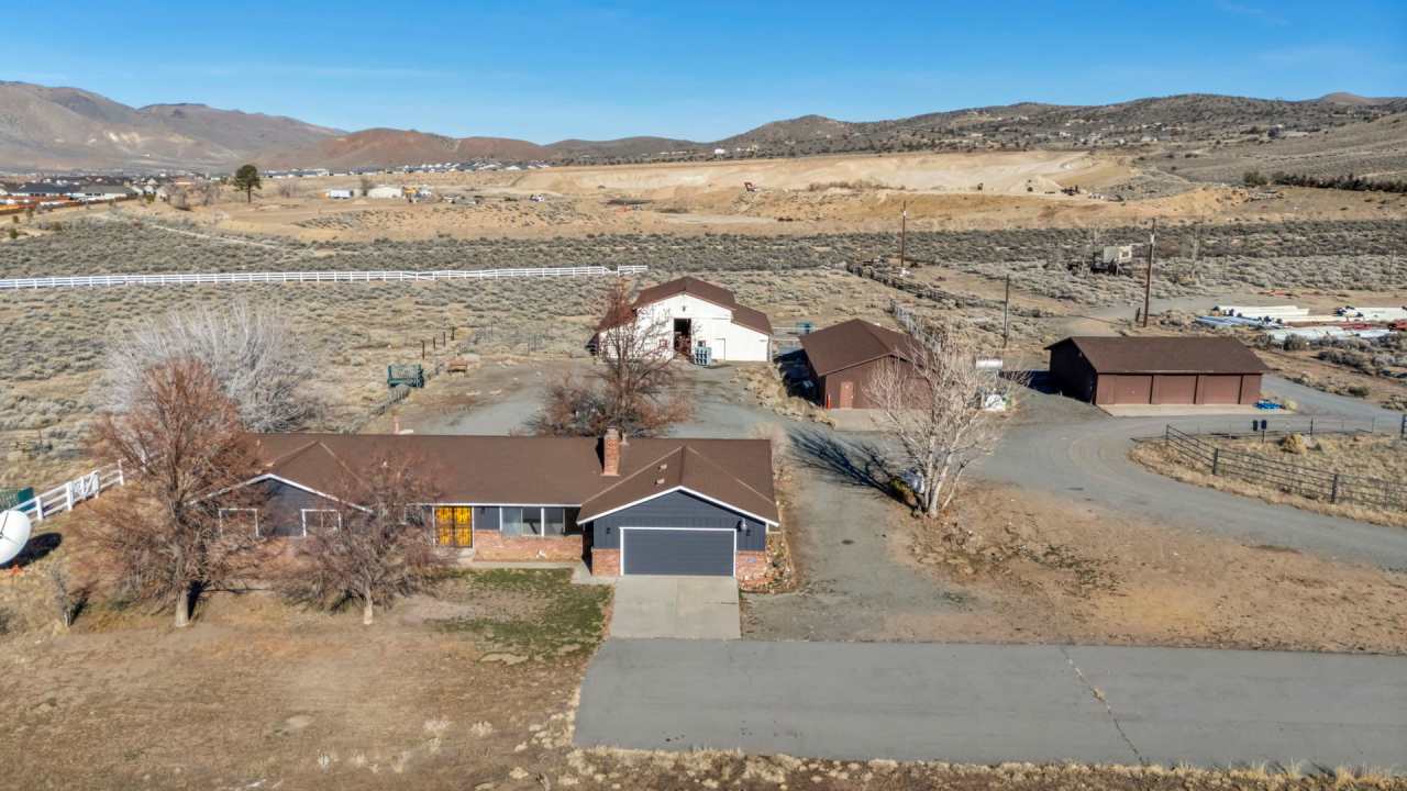 20 Acre Ranch with House, Barn, Separate Workshop, and 5-Car Garage