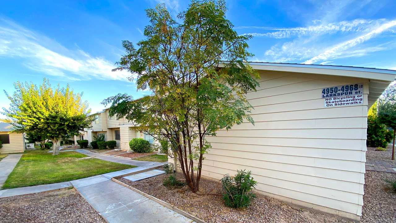 Great 3 bedroom and 1.5 bath townhouse with a small yard and 2 car garage.