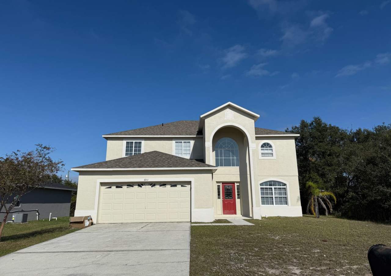 GORGEOUS, Large Completely Renovated Two-Story 4/2.5 PLUS LOFT in POINCIANA VILLAGES!
