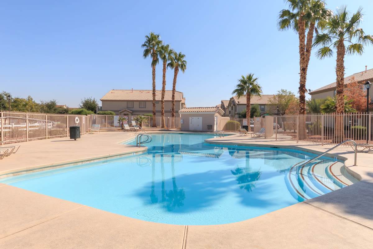 Two bedroom townhome with garage in gated Henderson community.