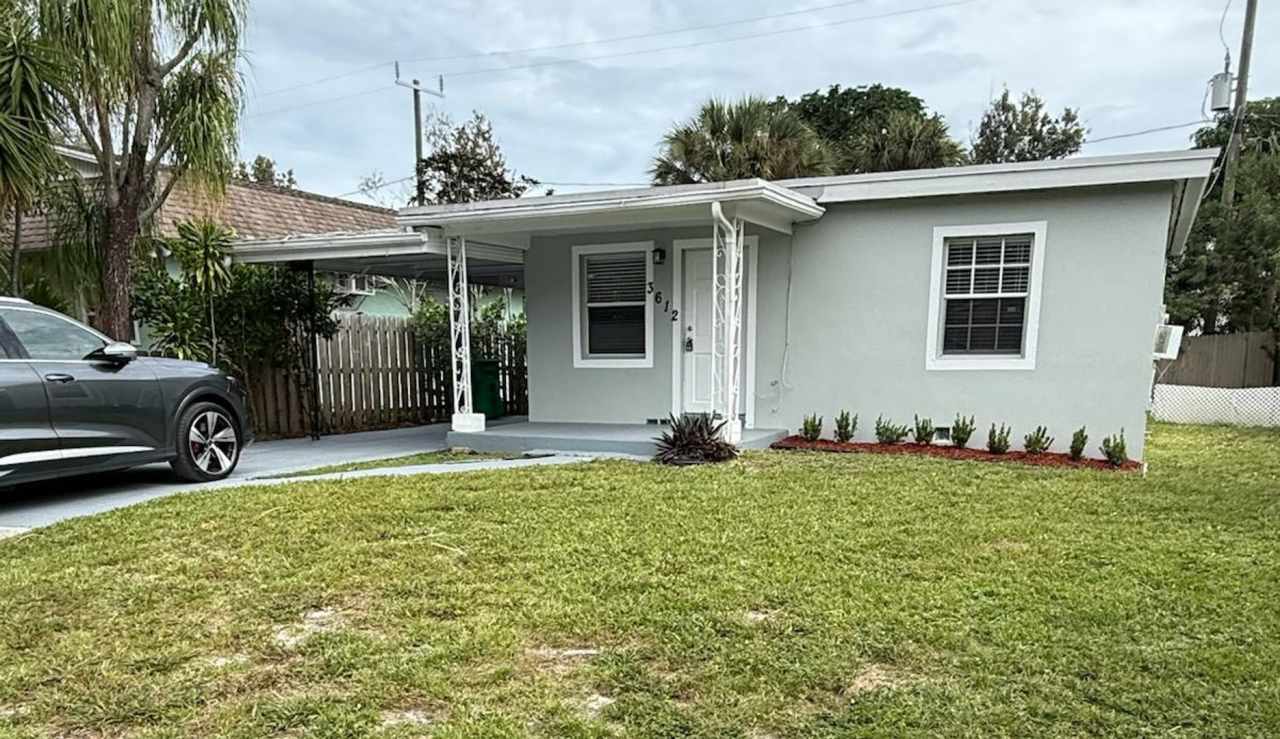 Charming 2/1 Single Family Home with large carport