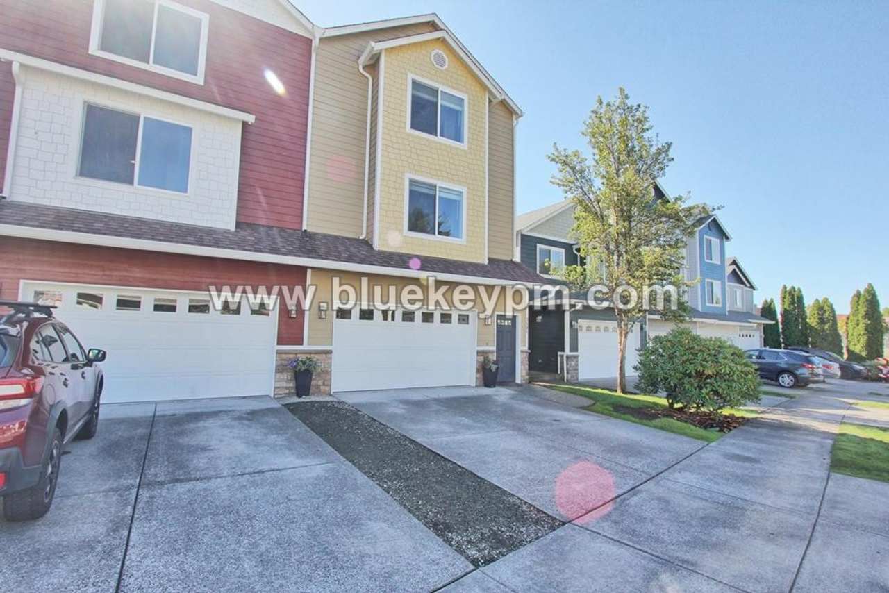 3 Bed, 3.5 Baths Townhome With Garage Level Suite and Office Space