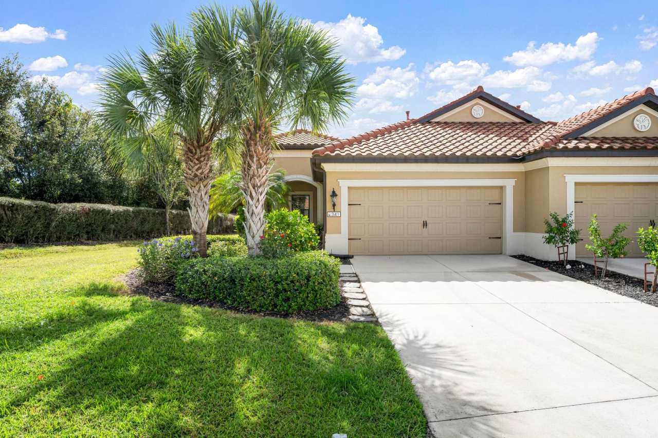 GORGEOUS 2 BEDROOM, 2 BATHROOM WITH A LARGE DEN AND 2 CAR GARAGE VILLA WITH A BEAUTIFUL LAKE VIEW LOCATED IN THE HIGHLY SOUGHT AFTER GATED MILANO COMMUNITY WITH AMAZING UPGRADES.