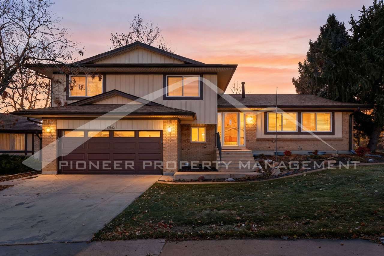 Spacious Home with 2 Car Garage and Fenced in Backyard!