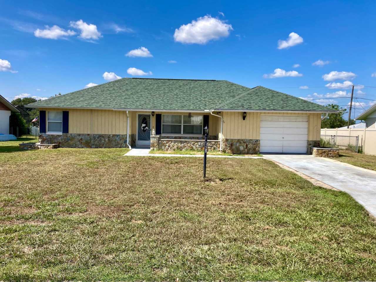 Available Now! 2 bedroom, 1.5 bath home with one car garage and fenced yard