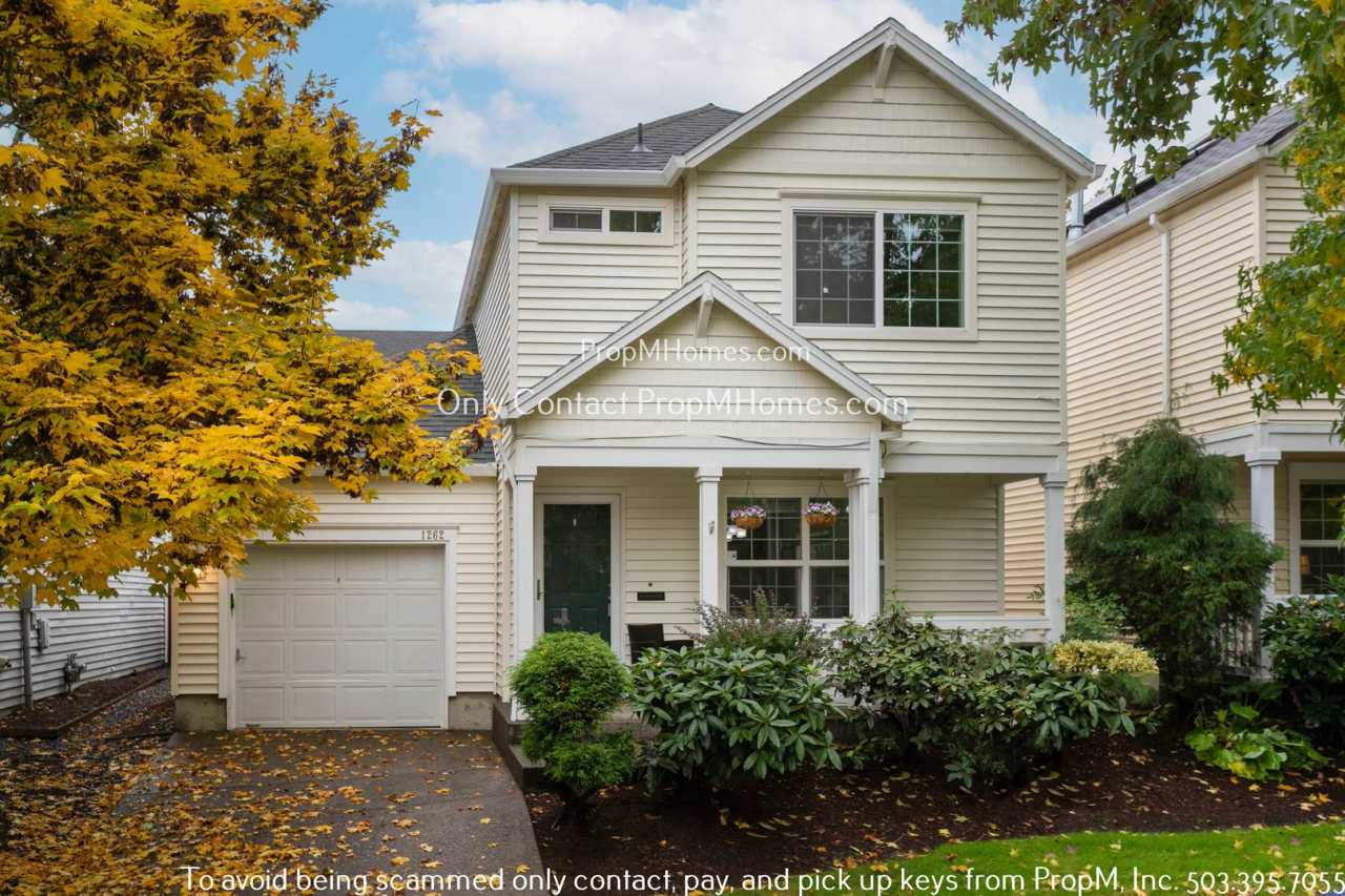 Modern Comforts: Attached Garage  Serene Backyard Deck!