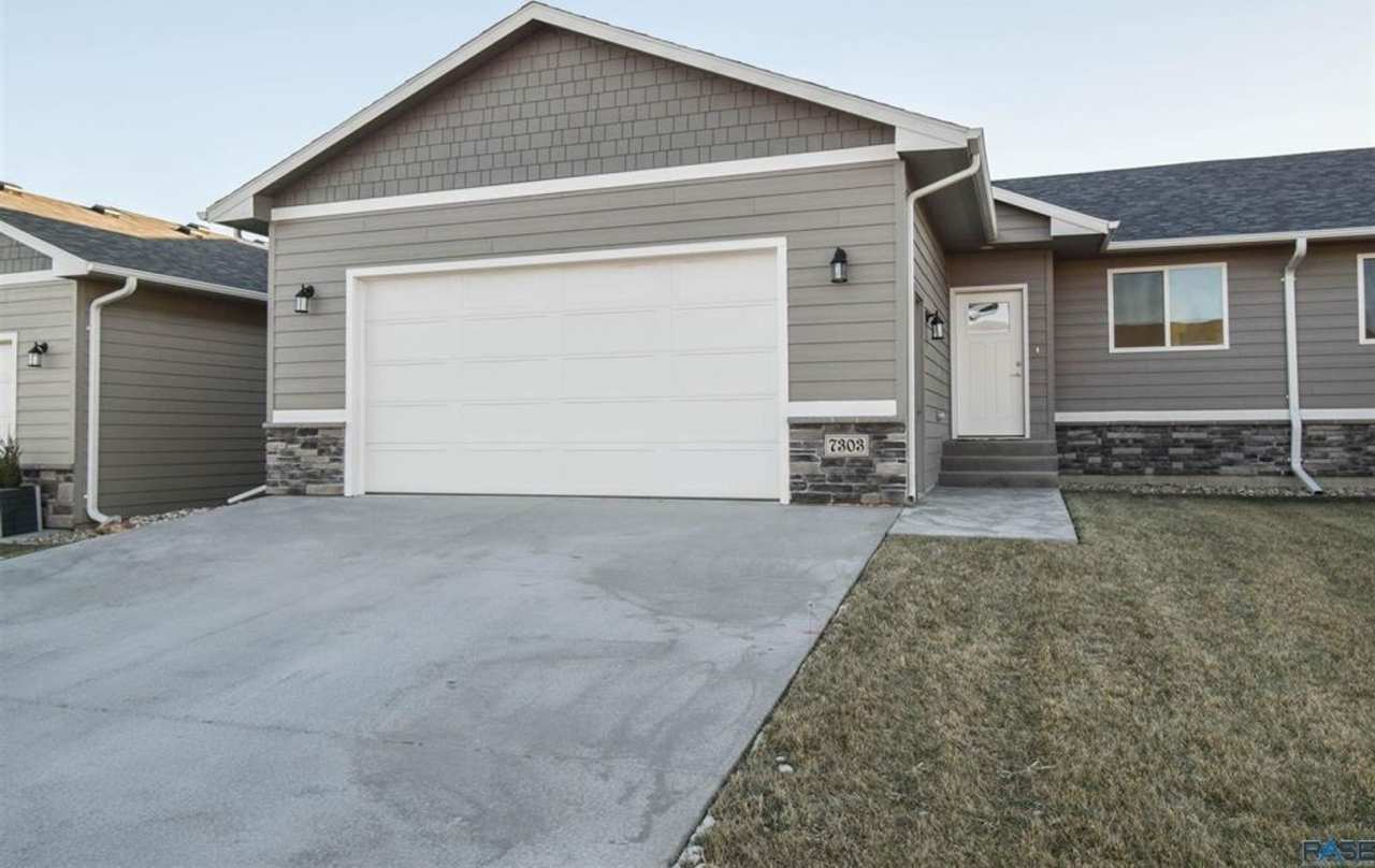 Modern Twin Home with Walk-Out Basement  Oversized Garage!