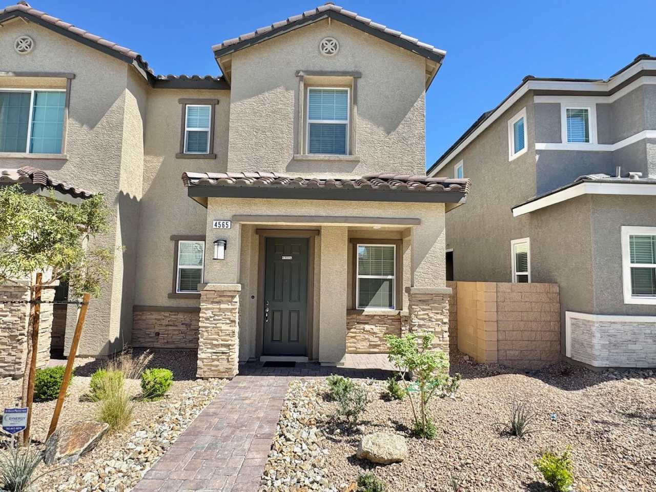 RICHMOND AMERICAN DESIGNER HOME FEATURING CENTER-MEET SLIDING DOORS, STAINLESS STEEL GE APPLIANCES