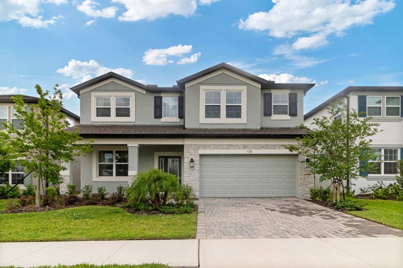 Discover luxury living in the gated Whispering Oaks community of Watergrass!