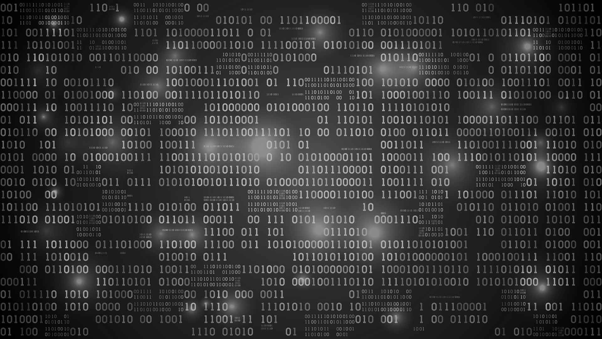 Binary code displayed as groups of ones and zeros.