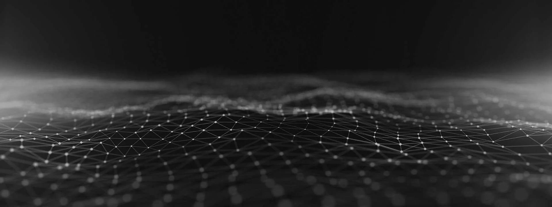 A series of connected dots in the shape of waves on the ocean.