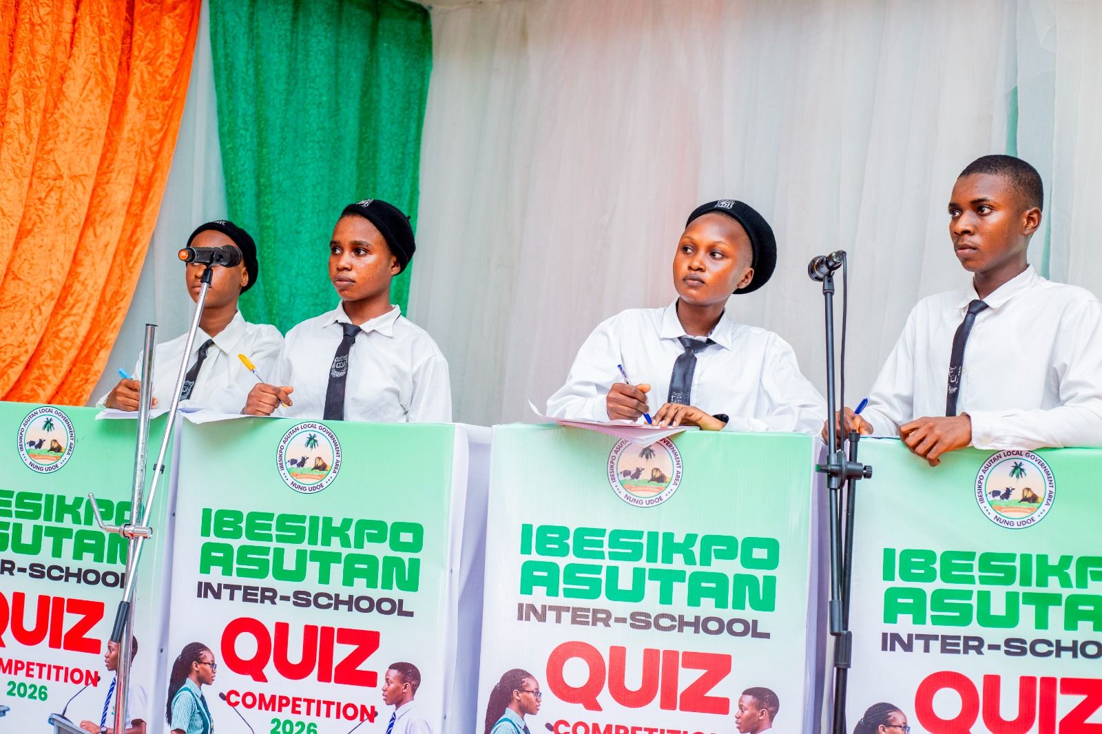 Contestants at their lecterns