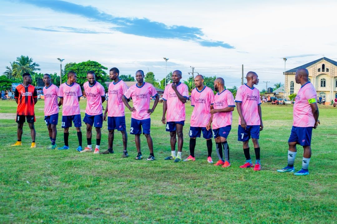 A team lines up on the pitch