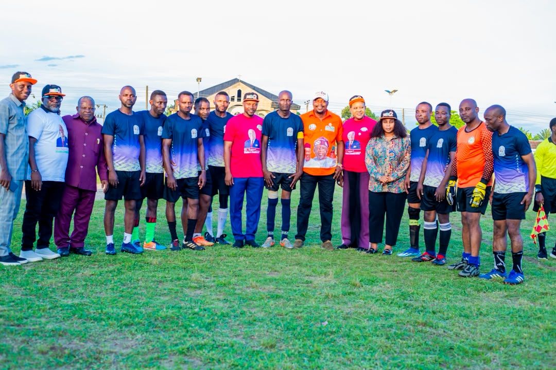 Both teams and officials line up before a match