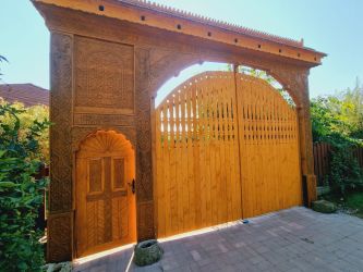 Szekelykapuk, kerítések,kopjafák, tornácok, asztalos munkák