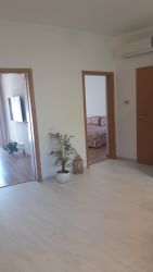 Eladó egy modern, 67 m2 -es, TERASZOS, ÚSZÓMEDENCÉS lakás