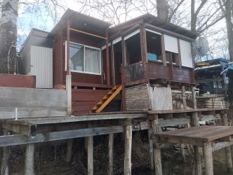 Horgásztanya eladó saját stéggel és csónakkal