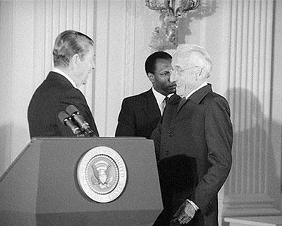 U.S. President Ronald Reagan awards Cousteau with the Medal of Freedom